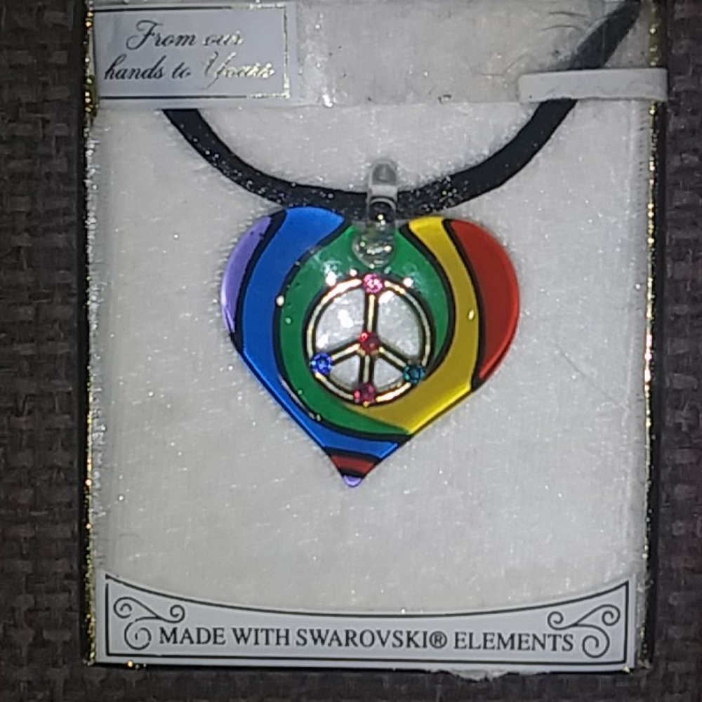 Hand blown glass ☮️ sign necklace. 18" rope